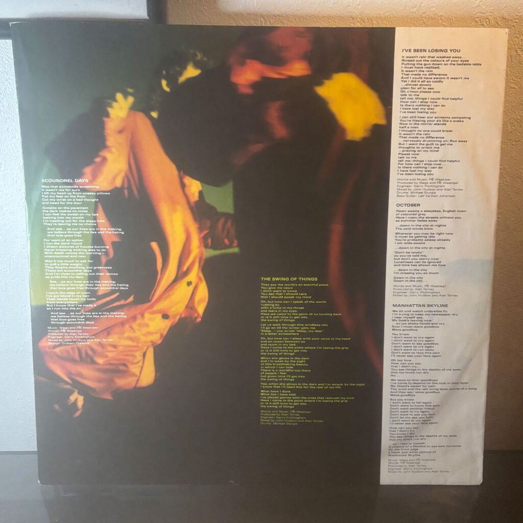 Original printed inner sleeve for a-ha — Scoundrel Days, side 1, with lyrics and credits.